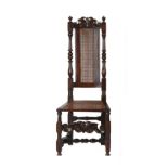 Property of a lady - a late 17th century carved walnut & cane panelled high-back chair (see