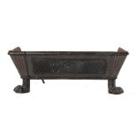 Property of a lady - a Regency style iron fire basket, with paw feet, 20.2ins. (51.3cms.) wide;