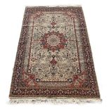 Property of a gentleman - a Persian carpet of Qum design, 96 by 60ins. (244 by 153cms.) (see