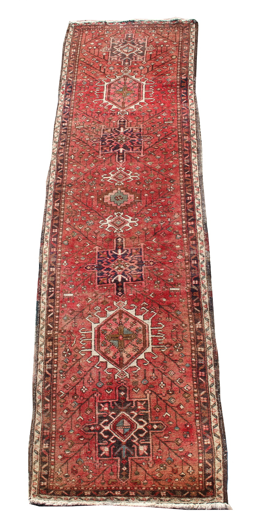 Property of a lady - a Hamadan runner, second half 20th century, with pale red ground, 120 by 32ins.