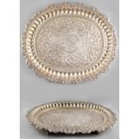 Property of a lady - a late 19th / early 20th century Indian silver oval tray, raised on paw feet,