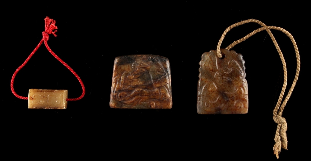 Property of a deceased estate - two Chinese jade pendants, both carved with a chilong to one