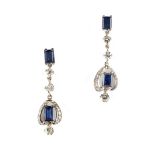 A pair of sapphire & diamond pendant drop earrings, each with two rectangular cut sapphires &