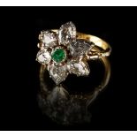 A late Georgian yellow gold emerald & diamond cluster ring, in the form of a flowerhead with round