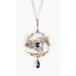 An early 20th century Belle Epoque sapphire & diamond floral open work pendant on later chain, the