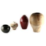 Property of a lady - four assorted ceramics including a Henan dark green glazed jar, Yuan Dynasty (