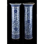 A large pair of Chinese blue & white sleeve vases, 19th century, painted with scrolling lotus,