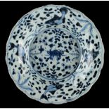 Property of a lady - a Chinese blue & white petal rimmed dish, Kangxi period (1662-1722), painted