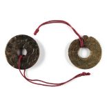 Property of a deceased estate - two Chinese carved jade bi discs, probably Ming Dynasty, 16th / 17th