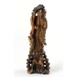 A large Chinese carved soapstone figure of Shoulao, restorations, 19.75ins. (50cms.) high (see