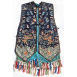 A good Chinese navy blue silk sleeveless jacket, late 19th / early 20th century, decorated in gilt