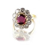 A fine 18ct yellow gold ruby & diamond flowerhead cluster ring, the certificated untreated Thai oval