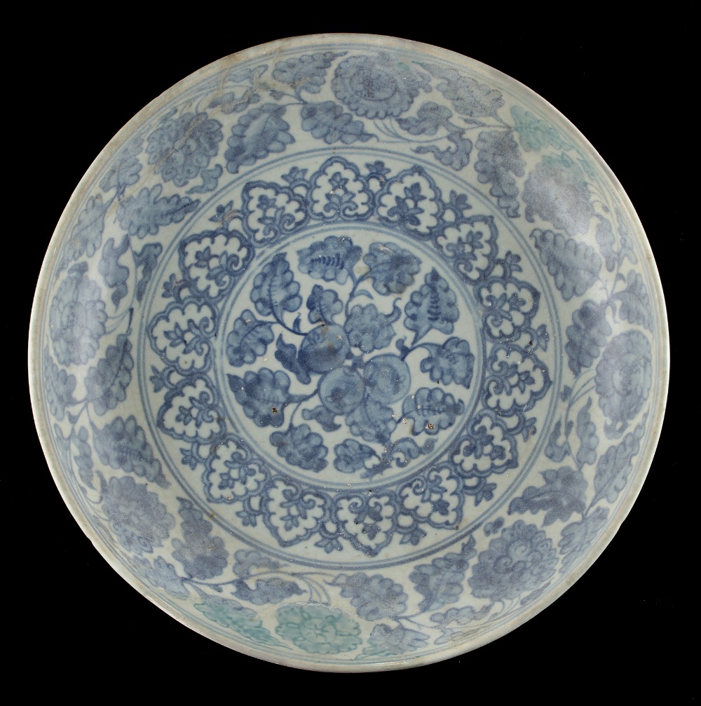 Property of a lady - a Chinese blue & white shallow dish, Ming Dynasty (1368-1644), restored, 12.