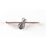 A 9ct yellow gold sapphire & diamond bug brooch, the pear shaped sapphire approximately 8.5mm