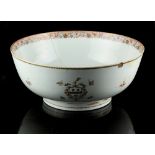 A Chinese famille rose armorial punch bowl, Qianlong period (1736-1795), painted to either side with