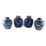 Two similar pairs of Chinese blue & white ovoid ginger jars with covers, 19th century, each