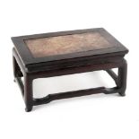 A Chinese hongmu rectangular stand, circa 1900, with inset pink veined marble top, 8.25ins. (21cms.)