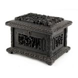 Property of a lady - a 19th century Chinese Canton carved ebony casket, 6.5ins. (16.5cms.) wide (see