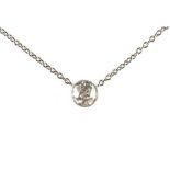A diamond solitaire pendant necklace, the round brilliant cut diamond weighing approximately 1.11