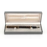 Property of a gentleman - a Dunhill tortoiseshell fountain pen, in original box (see illustration).