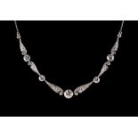 An early 20th century Belle Epoque diamond articulated necklace with round brilliant cut diamonds in