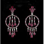 An impressive pair of white gold ruby & diamond hoop & multi tassel earrings, for pierced ears,