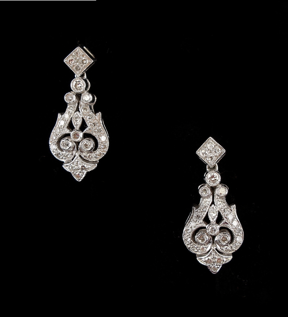 Property of a lady - a pair of Belle Epoque style 18ct white gold diamond pendant earrings, for