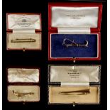 Property of a lady - four boxed gold bar brooches or stock pins, comprising a 9ct gold & enamel