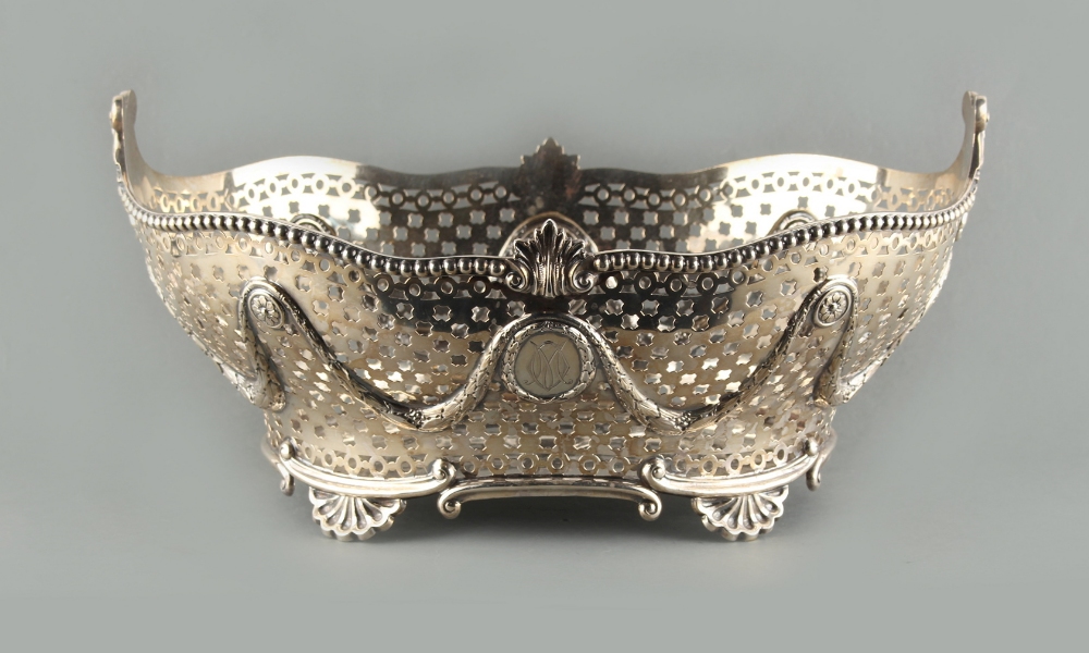 Property of a lady - an Edwardian silver pierced basket with swag decorations, Charles Stuart