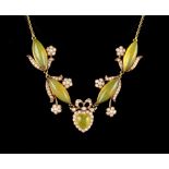 An attractive yellow gold chrysoprase & seed pearl floral link necklace with bow & heart link to