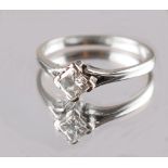 Property of a lady - an 18ct white gold diamond solitaire ring, the certificated square cut