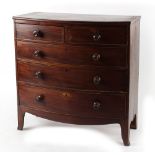 Property of a gentleman - an early 19th century mahogany bow-fronted chest of two short & three long