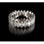 Property of a lady - a diamond eternity ring or dress ring, set with twenty-two marquise cut