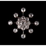 A late 19th / early 20th century diamond star brooch, set with Old European cut diamonds weighing an