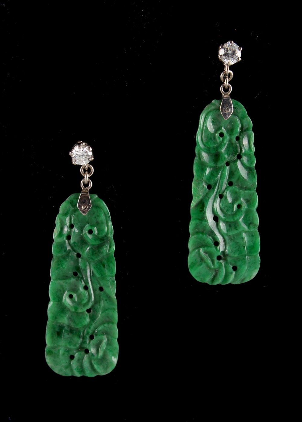 A pair of Chinese carved & pierced jadeite pendant earrings, the certificated untreated jadeite