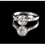 A platinum diamond solitaire ring, the round brilliant cut diamond weighing approximately 1.25