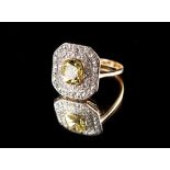 An Art Deco yellow gold fancy yellow diamond & white diamond cluster ring, the cushion cut fancy