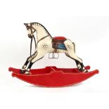 Property of a gentleman - a carved & painted wood dapple grey rocking horse, with bow rocker,