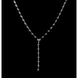 An 18ct white gold diamond link necklace of single tassel form, set with thirty-two round