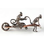 A 19th century Continental diamond brooch modelled as a monkey pulling another monkey in a cart,