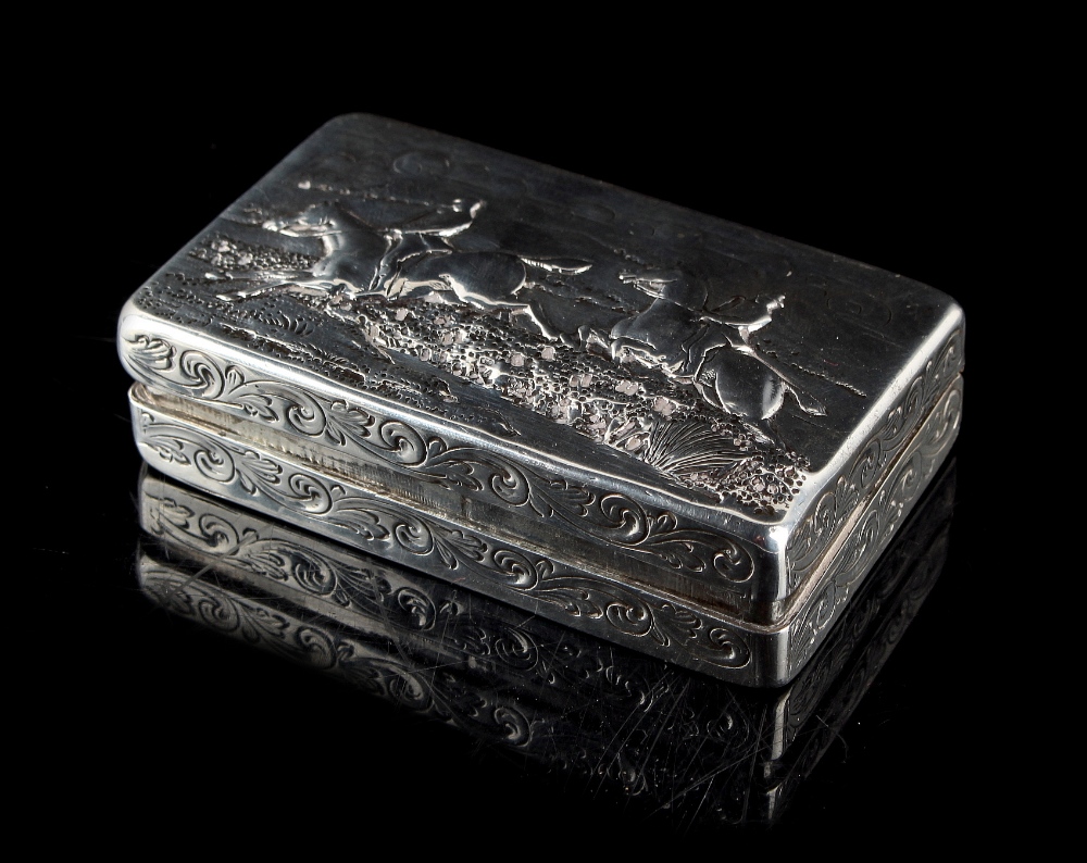Property of a lady - an early Victorian silver rectangular snuff box, the hinged lid with repousse