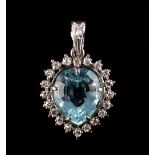 A white gold aquamarine & diamond heart shaped pendant, the heart shaped cut aquamarine weighing