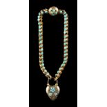 An early Victorian unmarked yellow gold & turquoise link bracelet, the heart shaped locket with