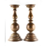 Property of a gentleman - a pair of patinated bronze pricket baluster candlesticks,19.5ins. (49.