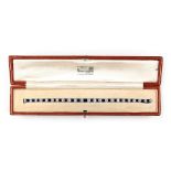 An Art Deco style certificated sapphire & diamond bracelet, the engraved box link setting probably