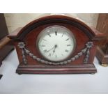 An Early XX Century Mahogany Case Mantel Clock, with applied swags and brass ball feet, French