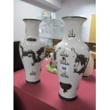 A Pair of Chinese Pottery Vases, back with applied sinuous dragon decoration, 31cm high.