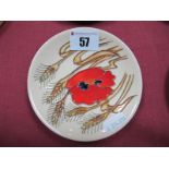 A Moorcroft Pottery Coaster, decorated with the 'Harvest Poppy' design by Emma Bossons, shape 780/4,