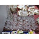 A Part Suite of Crystal Glassware; plus a cut glass caraffe:- One Tray