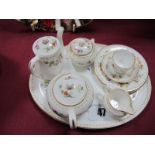 A Wedgwood Bone China Miniature Four Piece Tea Set, matching trio and oval tray. (8)